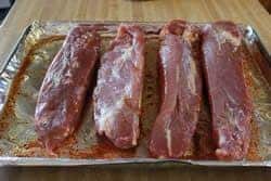 Roll pork tenderloins over to bottom side up
