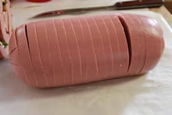 Slice bologna about ¾ of the way through