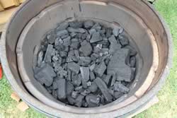 Fill the Big Green Egg with lump charcoal