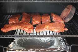 Ribs laid out on the grate