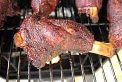 Lamb shanks almost done.. notice the rub is not burnt