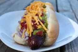Smoked hotdogs piled high with extras