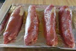 Drizzle oil onto pork tenderloins