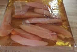 Place chicken breast tenders into a ziptop bag with brine