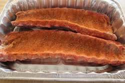 Sprinkle rub on bottom side of ribs