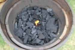 Place fire starter in center of charcoal