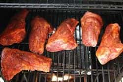 Place the lamb shanks on the smoker grate