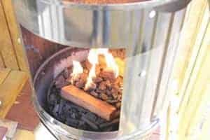 Set the smoker body onto the charcoal chamber
